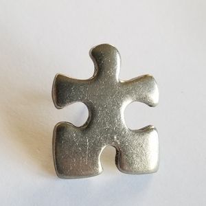 Puzzle piece pin by Clift silver tone lapel brooch Autism awareness